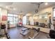 Bright gym offers weights, machines, and mirrors for a complete workout at 4803 N Woodmere Fairway -- # 1002, Scottsdale, AZ 85251