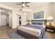 Stylish primary bedroom featuring a plush bed, modern decor, and ample natural light at 4803 N Woodmere Fairway -- # 1002, Scottsdale, AZ 85251