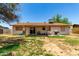 Spacious backyard with covered patio, grill, and room for entertaining or outdoor activities at 4845 W Sweetwater Ave, Glendale, AZ 85304