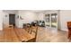 Dining area with hardwood floors and a sliding glass door at 4845 W Sweetwater Ave, Glendale, AZ 85304