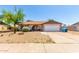 Charming single story home with a large front yard and attached two car garage at 4845 W Sweetwater Ave, Glendale, AZ 85304
