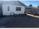 Spacious backyard with dirt landscaping and a block fence at 5735 N 32Nd Dr, Phoenix, AZ 85017