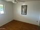 Unfurnished room with a window and ceiling fan, providing a blank canvas at 5735 N 32Nd Dr, Phoenix, AZ 85017