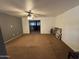 Spacious living room area with overhead fan and lots of room for entertaining at 5735 N 32Nd Dr, Phoenix, AZ 85017