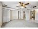Spacious bedroom with carpet flooring, ample closet space, and neutral decor, creating a serene atmosphere at 5803 W John Cabot Rd, Glendale, AZ 85308