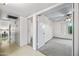 Hallway leading to a bedroom that offers natural light and a seamless transition between spaces at 5803 W John Cabot Rd, Glendale, AZ 85308
