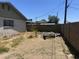 A backyard with a fence and little grass at 61 W 11Th Dr, Mesa, AZ 85210