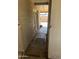 Covered walkway leading to a grassless backyard area at 61 W 11Th Dr, Mesa, AZ 85210