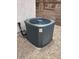 Exterior shot showing the home's air conditioning unit surrounded by small rocks at 6376 W Adobe Dr, Glendale, AZ 85308