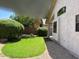 Well-kept backyard has grass and mature landscaping at 6376 W Adobe Dr, Glendale, AZ 85308