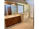 Bathroom featuring double sinks, separate tub, and tile flooring at 6376 W Adobe Dr, Glendale, AZ 85308