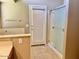 Bright bathroom featuring tile flooring and a glass-enclosed shower at 6376 W Adobe Dr, Glendale, AZ 85308