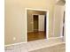 Office space showcasing wood flooring and an open view to another room at 6376 W Adobe Dr, Glendale, AZ 85308