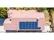 Aerial view of roof with solar panels above the large backyard and playground equipment at 6415 W Escuda Rd, Glendale, AZ 85308