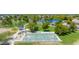 Aerial view of the Community basketball court surrounded by trees, and walking paths at 6415 W Escuda Rd, Glendale, AZ 85308