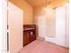 Well-organized bedroom with a built-in bed, lots of storage, and a cozy area rug at 6415 W Escuda Rd, Glendale, AZ 85308
