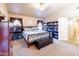 Spacious bedroom with carpeting, vaulted ceiling and large window at 6415 W Escuda Rd, Glendale, AZ 85308