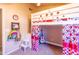 Bright bedroom featuring a charming loft bed with playful ladybug-themed decor at 6415 W Escuda Rd, Glendale, AZ 85308