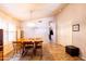 Spacious dining room featuring tile flooring, bright light, and room for up to six chairs at 6415 W Escuda Rd, Glendale, AZ 85308