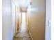 Hallway with tile floors and white doors leading to other rooms at 6415 W Escuda Rd, Glendale, AZ 85308