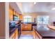 This spacious kitchen features granite countertops and wood cabinets at 6415 W Escuda Rd, Glendale, AZ 85308