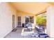 Covered patio with outdoor seating, perfect for relaxing and enjoying the outdoors at 6415 W Escuda Rd, Glendale, AZ 85308