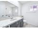 Bright bathroom with stone countertops, tiled shower, and toilet at 9641 N 36Th Dr, Phoenix, AZ 85051