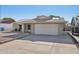 Charming single-story brick home featuring a two-car garage and a well-maintained front yard at 9641 N 36Th Dr, Phoenix, AZ 85051