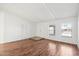 Bright living room featuring hardwood floors and bright windows at 9641 N 36Th Dr, Phoenix, AZ 85051