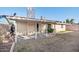 An exterior shot of the covered patio with views of the backyard at 9641 N 36Th Dr, Phoenix, AZ 85051