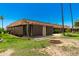 Exterior shot of a home with a well maintained lawn and landscaping at 10022 W Mountain View Rd, Sun City, AZ 85351