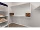 Spacious walk-in closet with ample shelving and hanging space, perfect for organization at 11103 E Blue Sky Dr, Scottsdale, AZ 85262