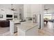 Spacious kitchen boasts an island, stainless appliances, granite counters, and open layout to the living spaces at 11103 E Blue Sky Dr, Scottsdale, AZ 85262