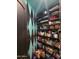 Unique pantry with plenty of shelving for optimal organization and storage at 11320 E Winchcomb Dr, Scottsdale, AZ 85255