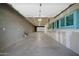 Spacious garage has ample storage and workshop area with access from overhead doors at 1208 E Tuckey Ln, Phoenix, AZ 85014