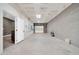 Large garage with concrete floors, side door and ample lighting at 1208 E Tuckey Ln, Phoenix, AZ 85014