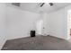 Bedroom featuring gray carpet flooring, white walls, and a ceiling fan at 12204 W Parkway Ln, Avondale, AZ 85323
