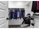 Walk-in closet featuring shelving and hanging racks for optimal storage at 12204 W Parkway Ln, Avondale, AZ 85323
