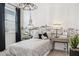 Bedroom featuring a whimsical wall mural, decorative lamps, and cozy furnishings at 1648 S 241St Ave, Buckeye, AZ 85326