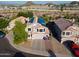 Expansive aerial view of a neighborhood featuring well-maintained homes and desert landscape at 1723 E Pontiac Dr, Phoenix, AZ 85024