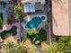 Aerial view showcases swimming pool, patios, spa and green space with tropical landscaping at 1723 E Pontiac Dr, Phoenix, AZ 85024
