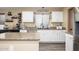 Kitchen featuring granite countertops, white cabinets, and stainless steel appliances at 1723 E Pontiac Dr, Phoenix, AZ 85024