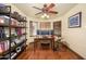 Dedicated office space with built-in shelving and wood floors at 1723 E Pontiac Dr, Phoenix, AZ 85024