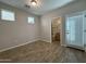 Bright bedroom features two windows and direct access to an adjoining bathroom at 1736 W Pollack St, Phoenix, AZ 85041