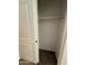 A walk-in closet with a rod for hanging clothes at 1736 W Pollack St, Phoenix, AZ 85041