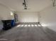 Well-lit garage featuring plenty of open space for storage, parking, and other hobbies at 1736 W Pollack St, Phoenix, AZ 85041