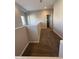 Upstairs hallway featuring carpeted floor and neutral paint, located near the bathroom at 1736 W Pollack St, Phoenix, AZ 85041