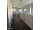Bright loft area with neutral paint, plush carpet, and natural light from multiple windows at 1736 W Pollack St, Phoenix, AZ 85041