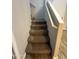 Carpeted staircase leading to the upper level, providing a comfortable and safe transition at 1736 W Pollack St, Phoenix, AZ 85041