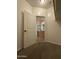 Spacious walk-in closet leads to a well-lit bathroom featuring double sinks and modern finishes at 1736 W Pollack St, Phoenix, AZ 85041
